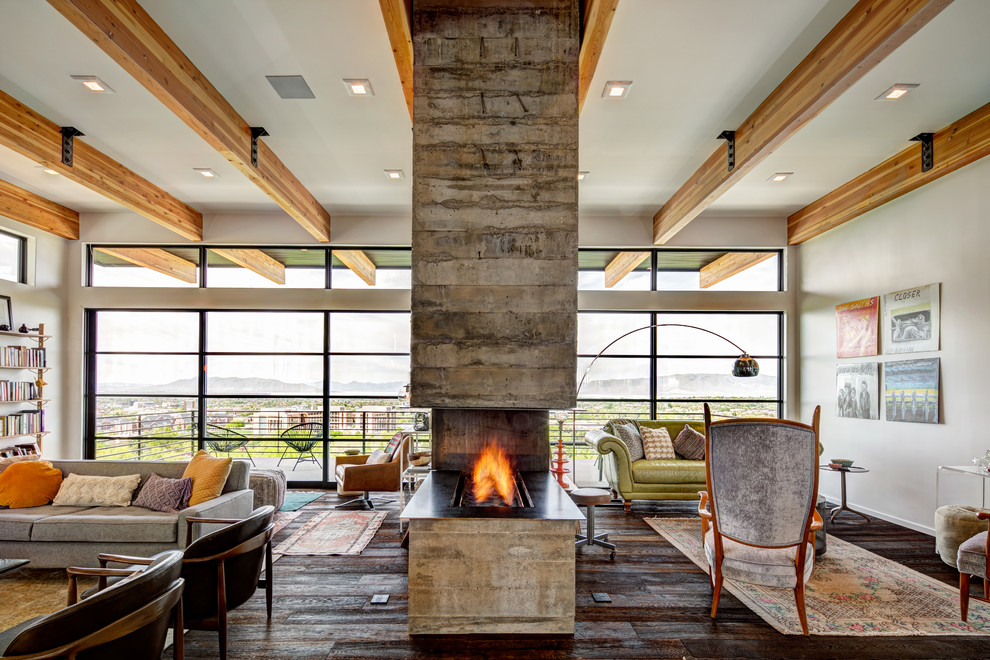 Inspiration for a midcentury open concept living room in Salt Lake City with grey walls, dark hardwood floors and a two-sided fireplace.