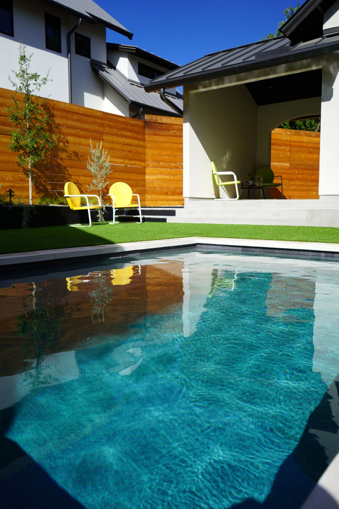 Small minimalist courtyard rectangular pool photo in Austin