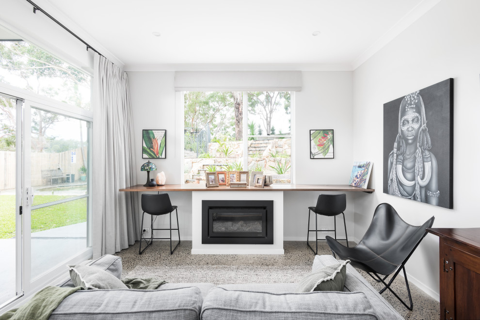 Design ideas for a contemporary living room in Sydney with grey walls, carpet, a standard fireplace and grey floor.