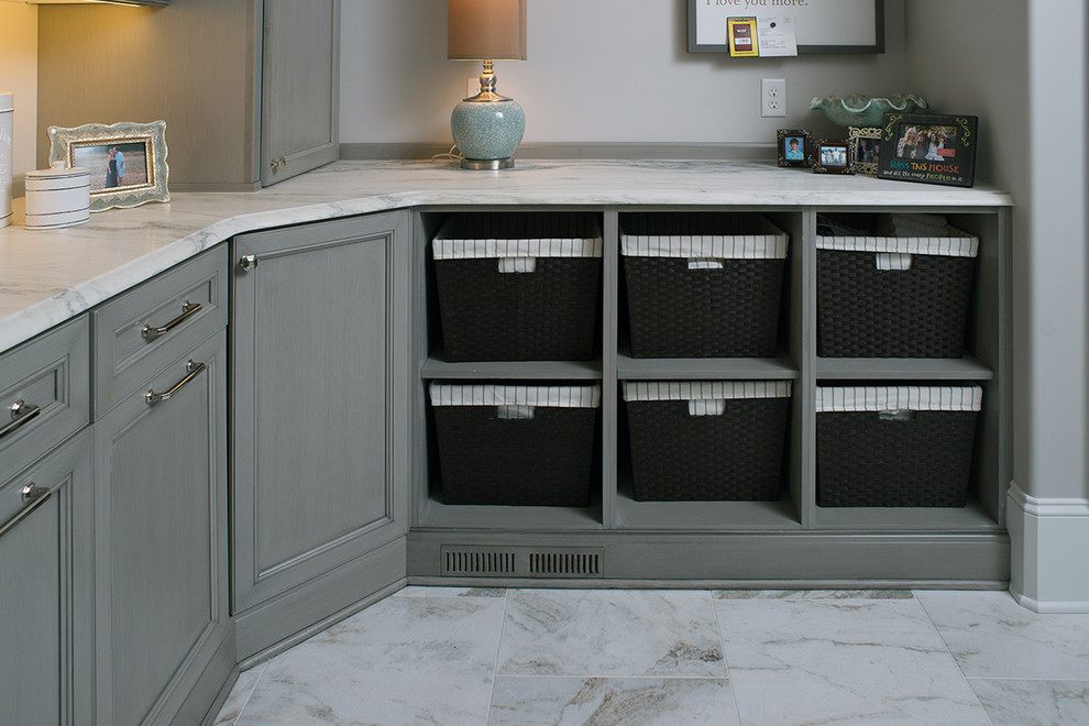Example of a classic laundry room design in Other