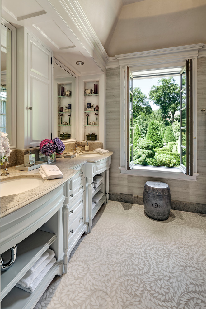 This is an example of a traditional master bathroom in New York with open cabinets, white cabinets, beige tile, ceramic tile, grey walls, mosaic tile floors, an undermount sink and granite benchtops.