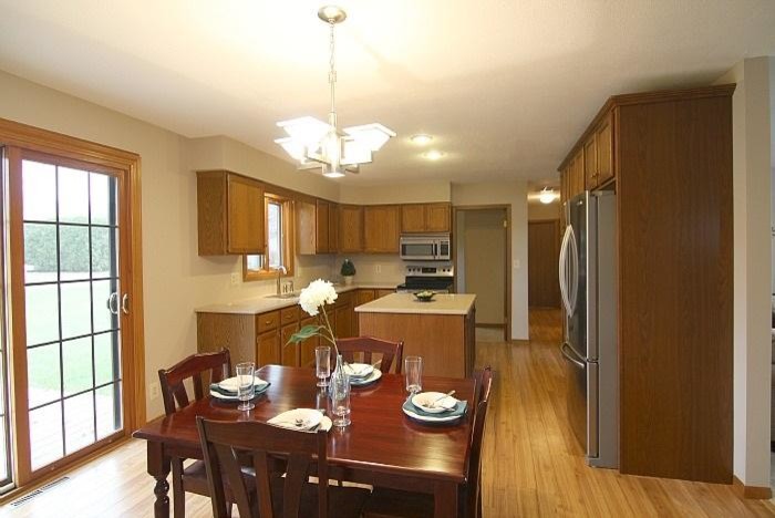 Example of a transitional dining room design in Cedar Rapids
