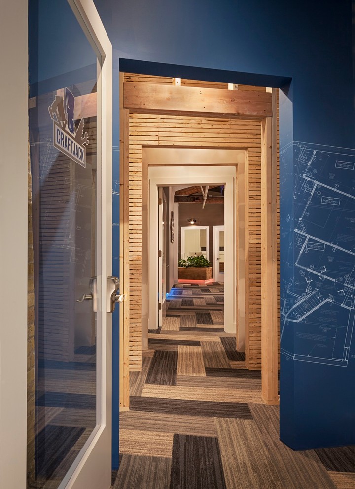 Inspiration for an eclectic carpeted hallway remodel in Chicago