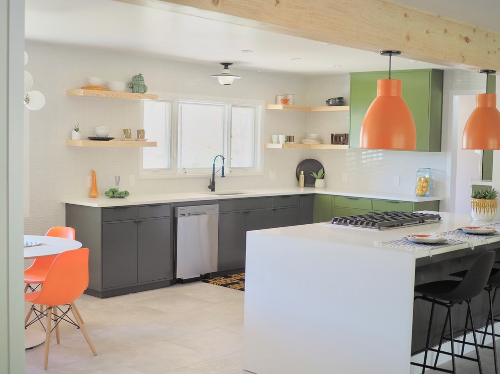 Inspiration for a midcentury u-shaped eat-in kitchen in Other with an undermount sink, flat-panel cabinets, green cabinets, white splashback, subway tile splashback, stainless steel appliances, with island, beige floor and white benchtop.
