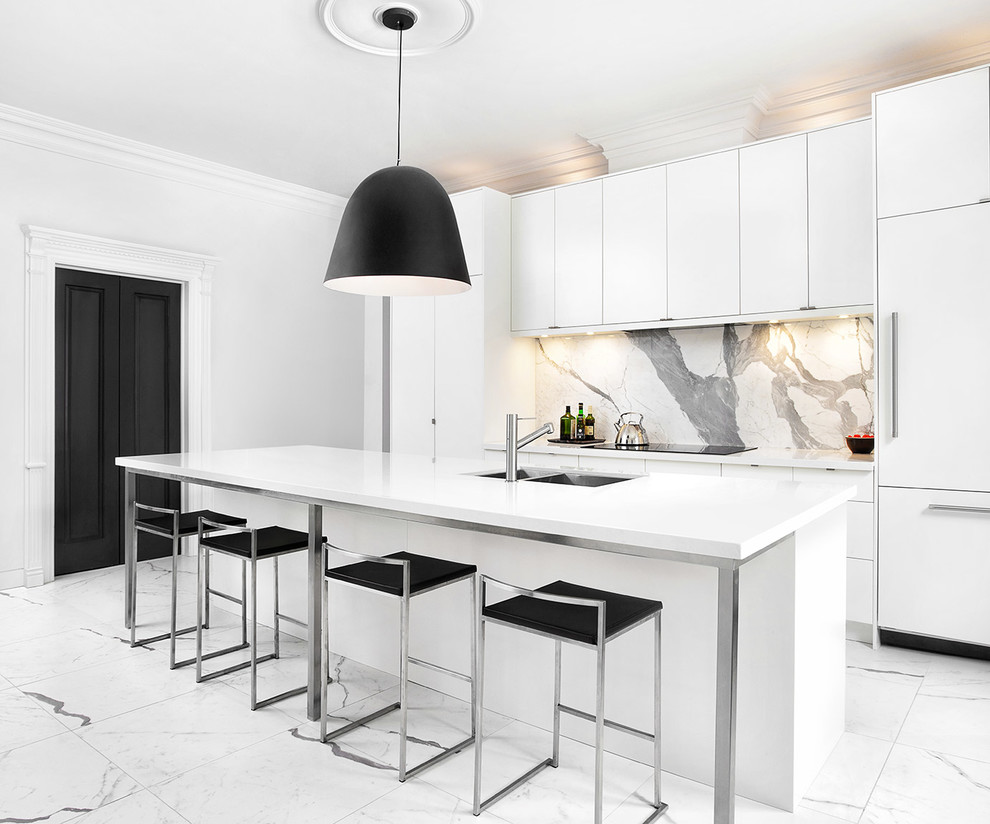 Large contemporary single-wall kitchen pantry in Toronto with an undermount sink, flat-panel cabinets, white cabinets, quartz benchtops, white splashback, stone slab splashback, stainless steel appliances, porcelain floors and with island.
