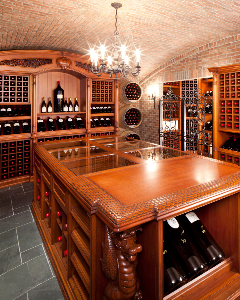 Expansive traditional wine cellar in New York with ceramic floors, display racks and grey floor.