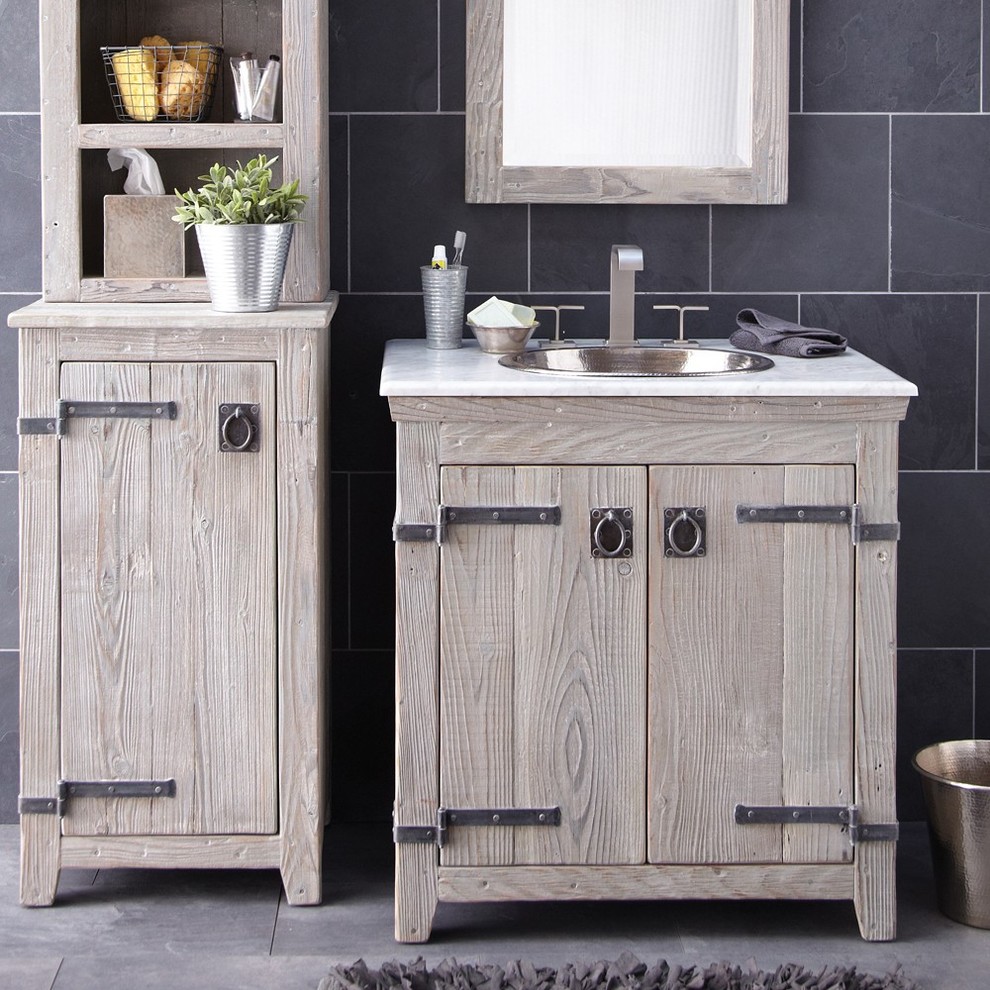 Inspiration for a mid-sized country bathroom in New York with furniture-like cabinets, light wood cabinets, gray tile, ceramic tile, grey walls and a drop-in sink.