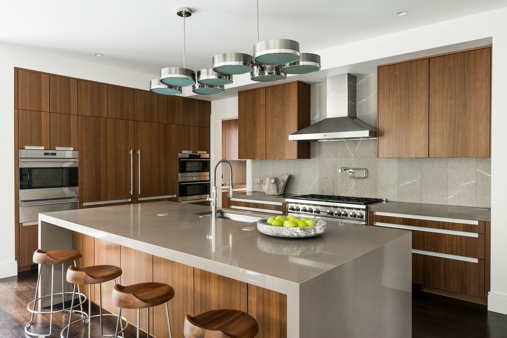 Photo of a contemporary l-shaped kitchen in Atlanta with an undermount sink, flat-panel cabinets, medium wood cabinets, grey splashback, dark hardwood floors, with island and brown floor.