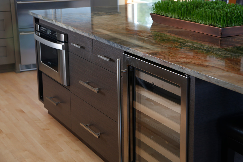 Open concept kitchen - mid-sized transitional l-shaped light wood floor open concept kitchen idea in Seattle with an undermount sink, recessed-panel cabinets, gray cabinets, quartz countertops, blue backsplash, ceramic backsplash, stainless steel appliances and an island