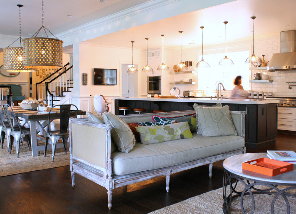 Inspiration for a transitional open plan kitchen in Tampa with shaker cabinets, white splashback, subway tile splashback and stainless steel appliances.