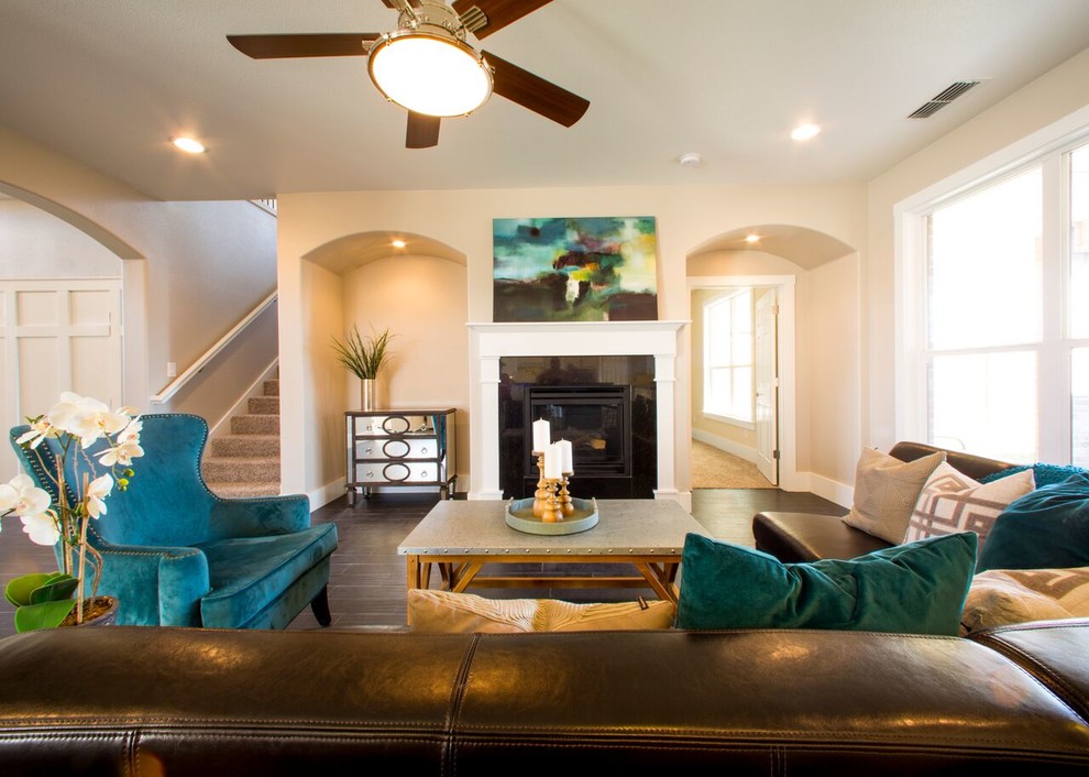 Home design - transitional open concept porcelain tile home design idea in Austin with beige walls, a standard fireplace and a stone fireplace