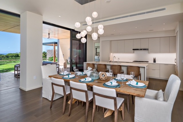 Design ideas for a transitional separate dining room in San Diego with medium hardwood floors and brown floor.