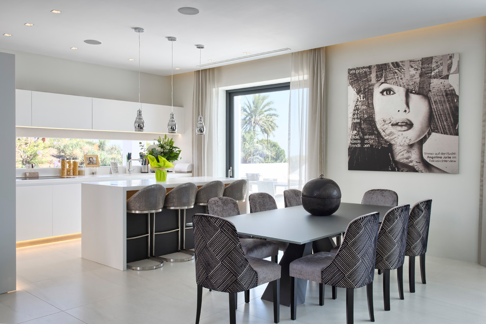 This is an example of a large contemporary open plan dining in Other with beige walls and beige floor.