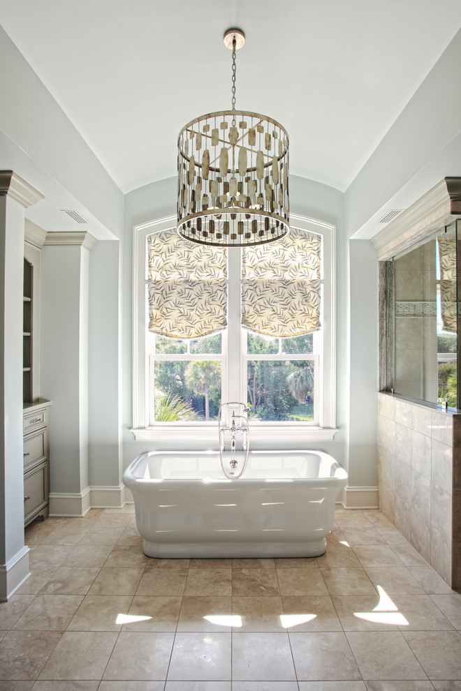 This is an example of a traditional bathroom in Charleston with a freestanding tub.
