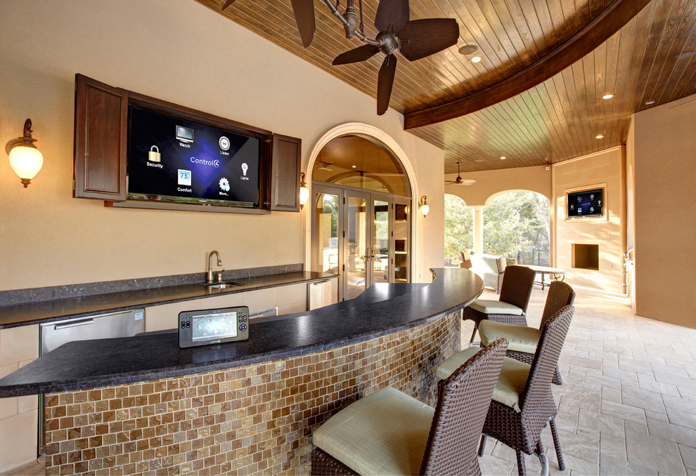 Patio - mediterranean patio idea in Dallas