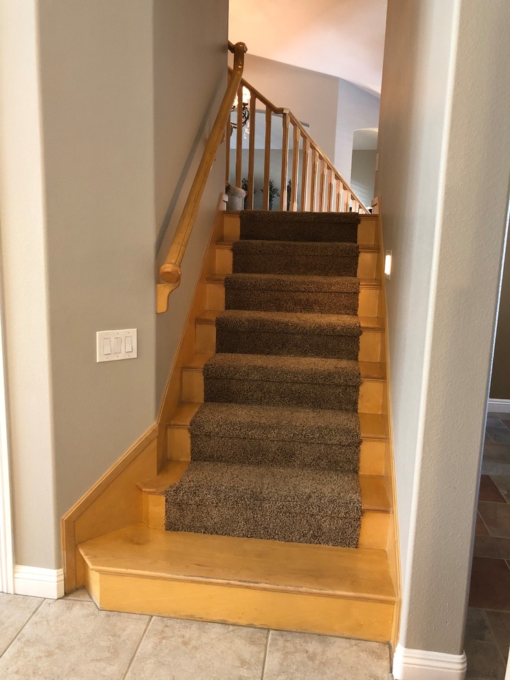 Queensridge Staircase Retrofit and Cabinet Refinish