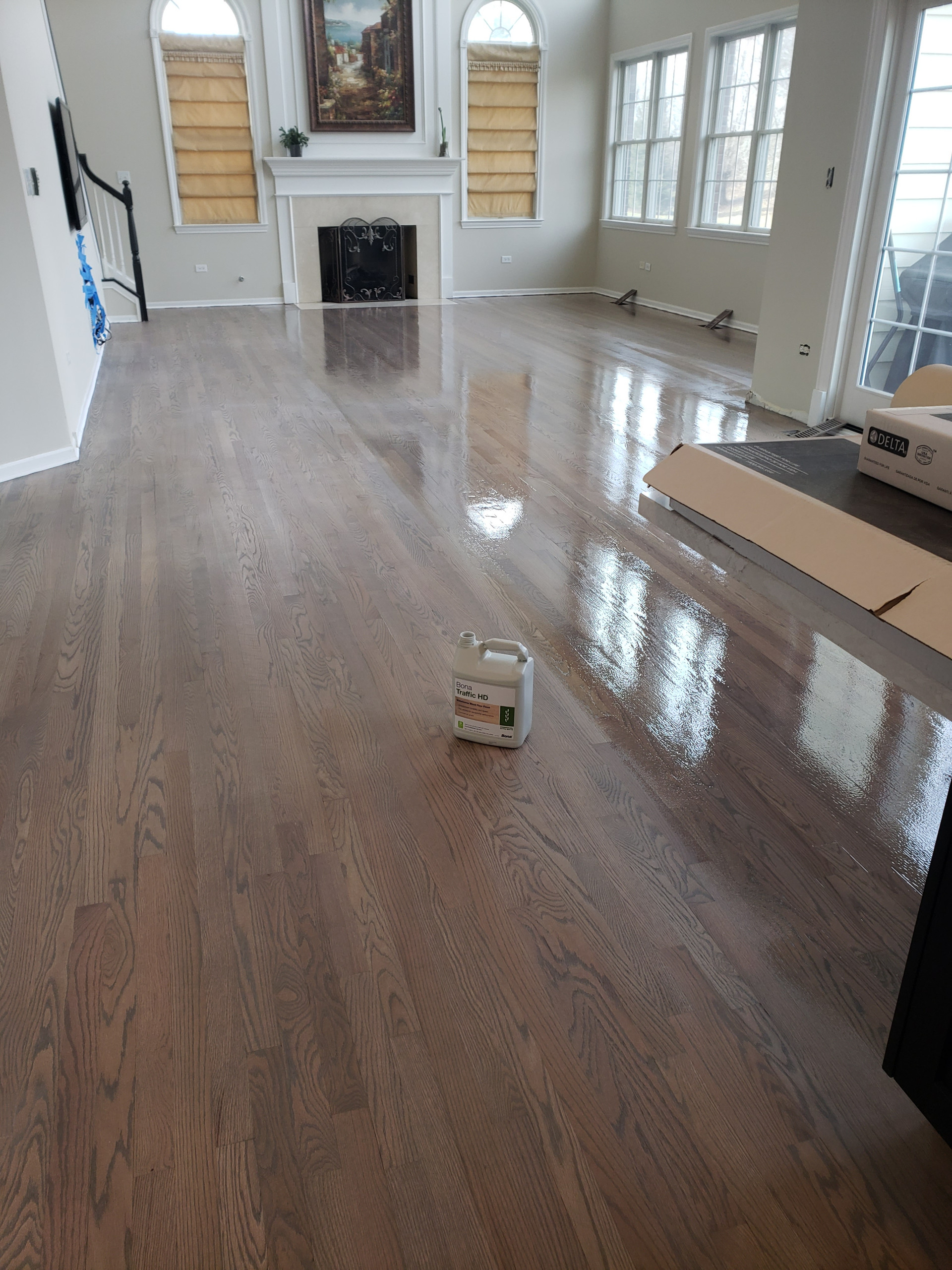 New 2 and 1/4 red oak flooring installed and old flooring refinished