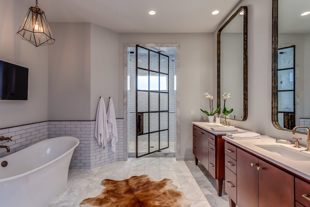 Contemporary bathroom in Nashville with red cabinets, a freestanding tub, an alcove shower, white tile, subway tile, white walls, an undermount sink, a hinged shower door and flat-panel cabinets.