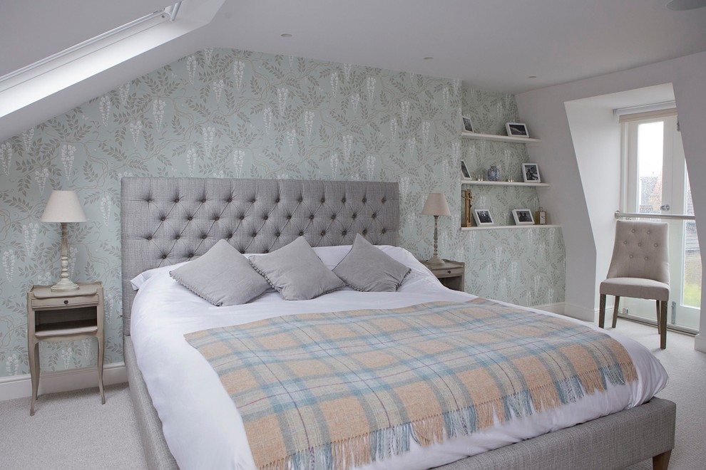 This is an example of a mid-sized transitional guest bedroom in Wiltshire with white walls, carpet and grey floor.