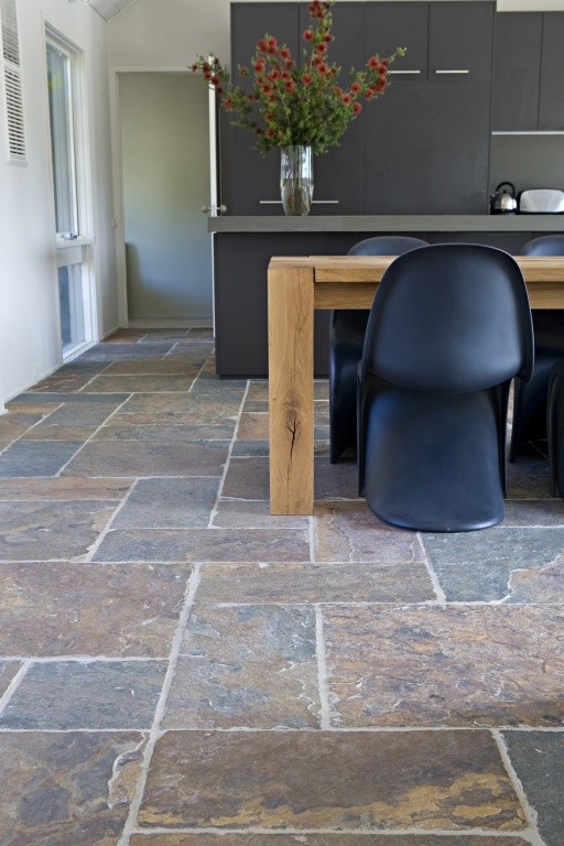 Inspiration for a large country kitchen/dining combo in Sydney with slate floors.