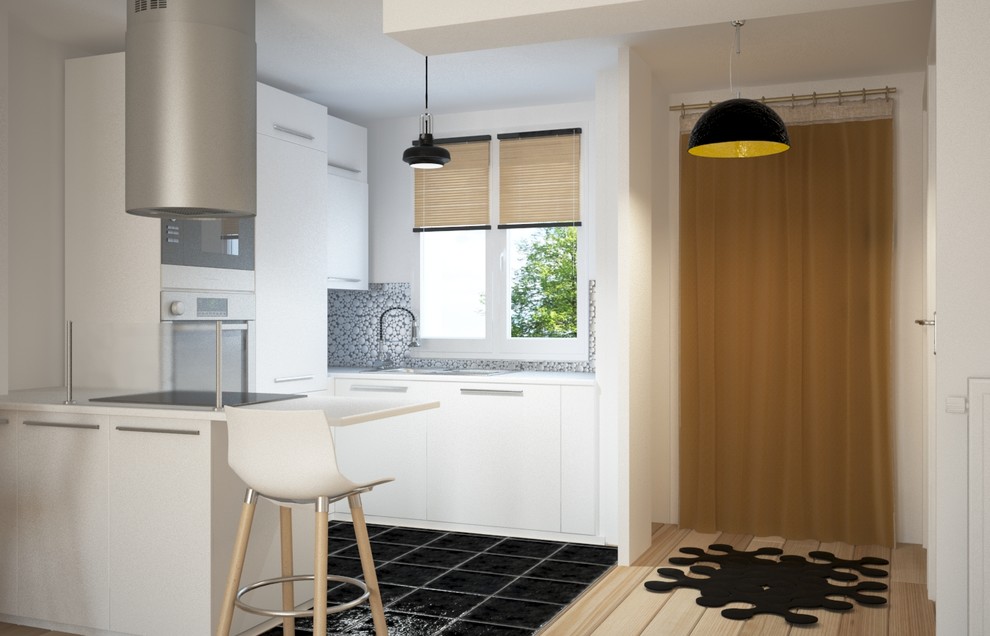 This is an example of a small contemporary u-shaped eat-in kitchen in Paris with a double-bowl sink, recessed-panel cabinets, white cabinets, laminate benchtops, metallic splashback, metal splashback, panelled appliances, ceramic floors, no island, black floor and white benchtop.