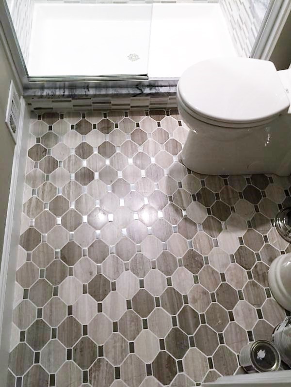 This is an example of a small traditional master bathroom in Baltimore with white cabinets, an open shower, a one-piece toilet, beige tile, ceramic tile, ceramic floors and a pedestal sink.