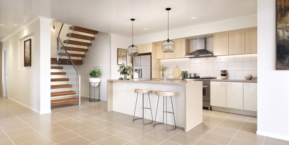 Design ideas for a mid-sized contemporary single-wall open plan kitchen in Melbourne with a double-bowl sink, light wood cabinets, solid surface benchtops, white splashback, ceramic splashback, stainless steel appliances, ceramic floors, with island and beige floor.