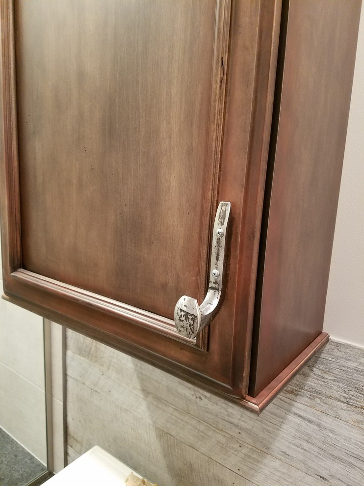 Small mountain style kids' gray tile and porcelain tile porcelain tile and gray floor alcove shower photo with furniture-like cabinets, distressed cabinets, a two-piece toilet, gray walls, an undermount sink, granite countertops and a hinged shower door