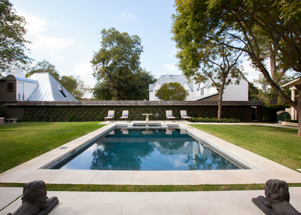 Hot tub - mid-sized traditional backyard stone and rectangular lap hot tub idea in Austin