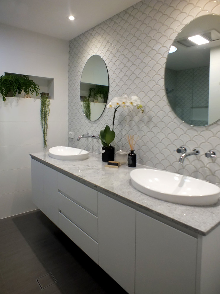 Design ideas for a large contemporary kids bathroom in Central Coast with mosaic tile, ceramic floors, a drop-in sink, granite benchtops, grey floor and grey benchtops.