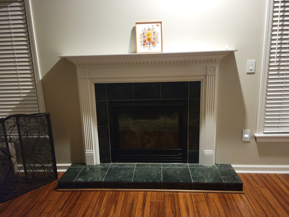 Retiling fireplace and removing raised hearth