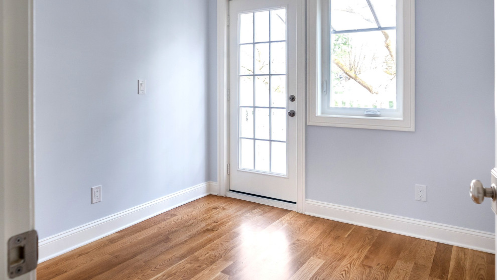Entry with Glass Door and Hardwood Floors