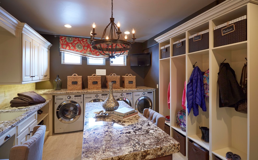 Design ideas for an expansive traditional utility room in Denver with an undermount sink, raised-panel cabinets, granite benchtops, brown walls, ceramic floors, a side-by-side washer and dryer and beige cabinets.