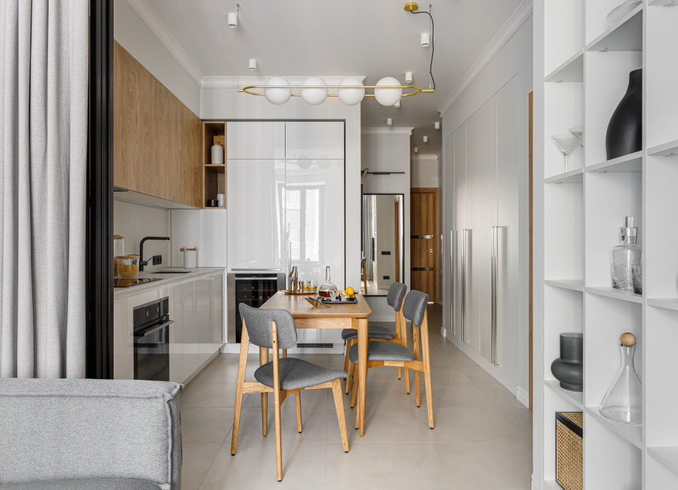 Small contemporary kitchen/dining room in Moscow with white walls, porcelain flooring and grey floors.