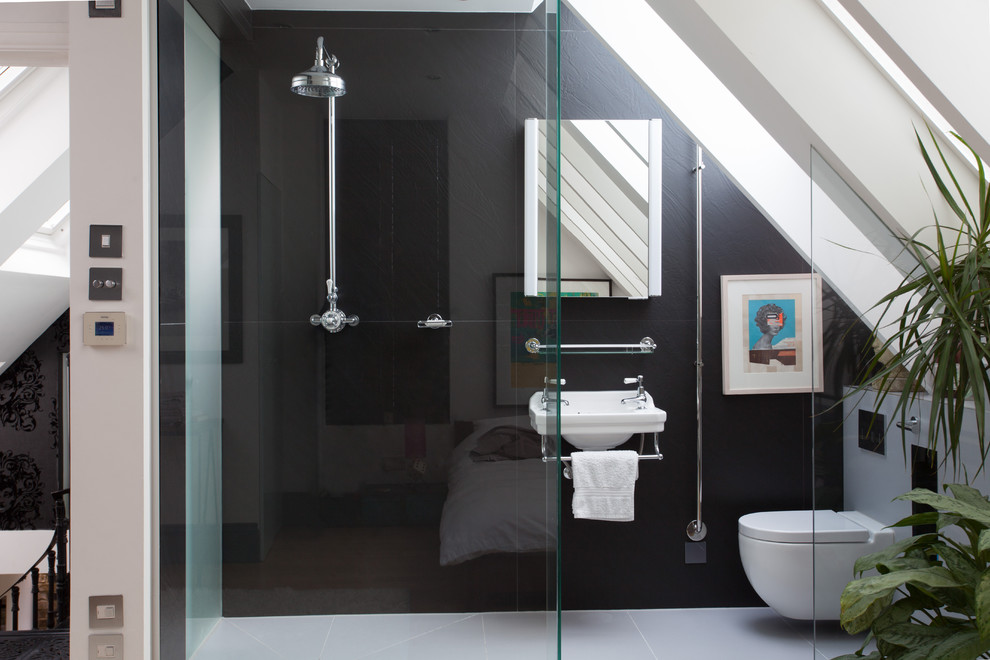 Photo of a small contemporary bathroom in London with a wall-mount sink and grey floor.