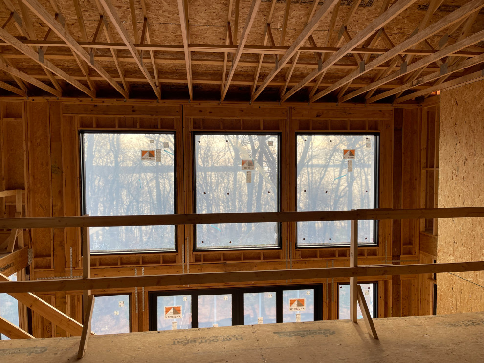 Black casement windows, white trim