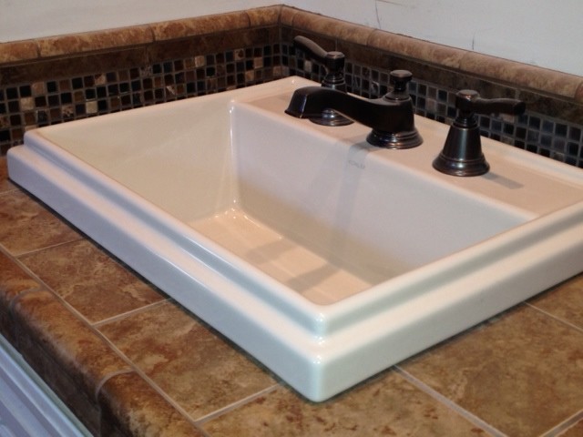 Example of a transitional bathroom design in Orange County