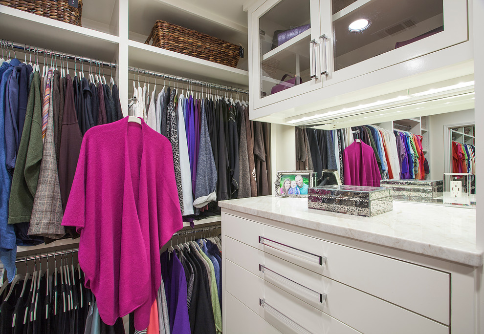 Inspiration for a mid-sized transitional women's walk-in wardrobe in Dallas with flat-panel cabinets, white cabinets and carpet.