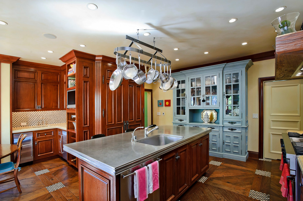 This is an example of a traditional eat-in kitchen in San Francisco with stainless steel appliances.