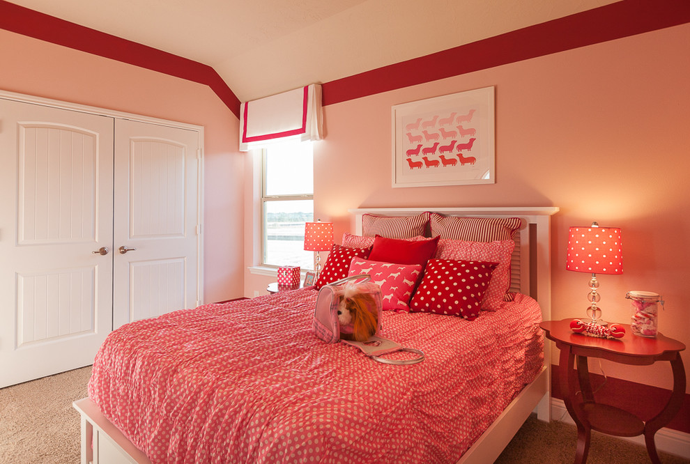 Inspiration for a mid-sized traditional bedroom in Houston with pink walls.
