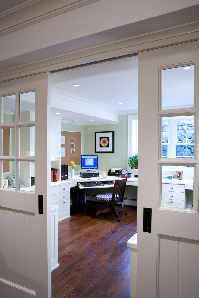 This is an example of a traditional home office in Boston.