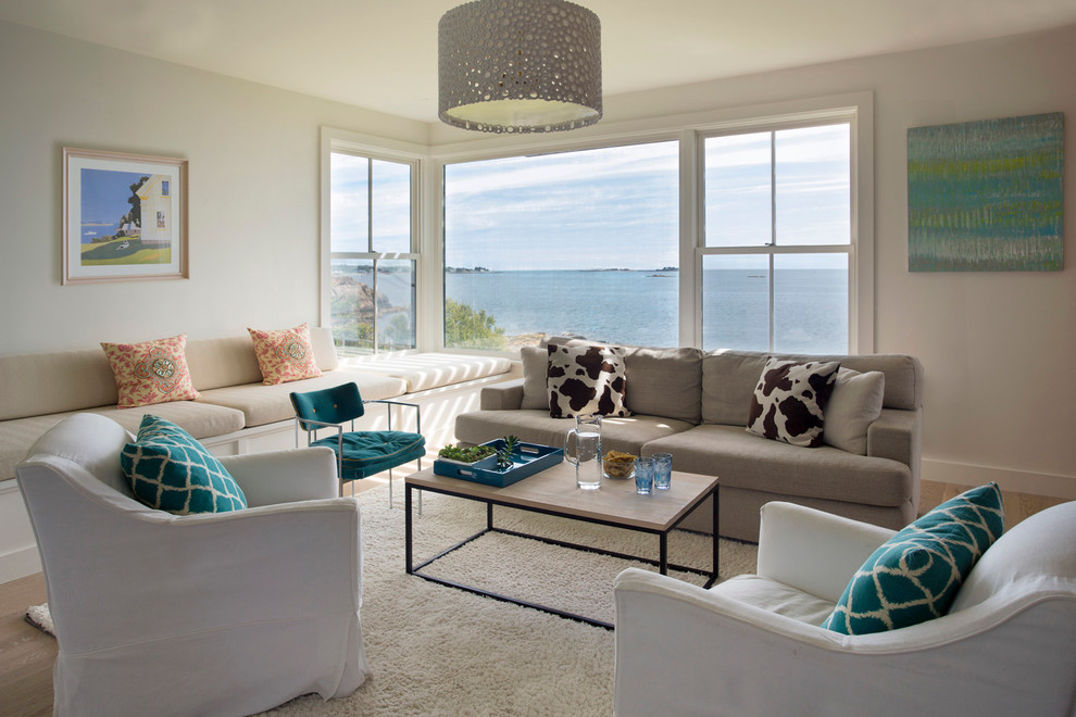 Inspiration for a large contemporary family room in Boston with white walls.