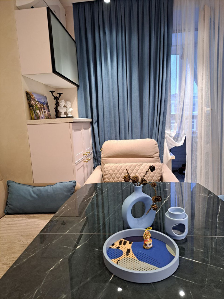 Обеденная зона в кухне-гостиной