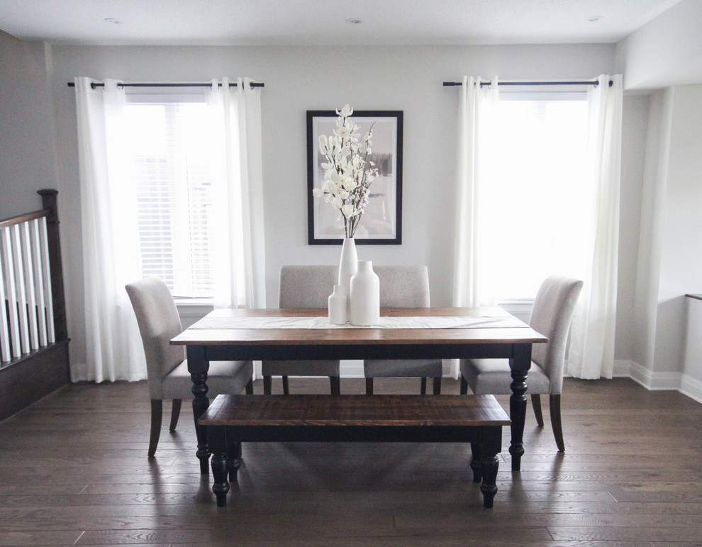 This is an example of a transitional dining room in Ottawa.