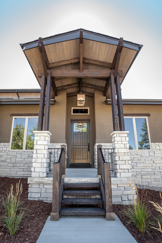 Mountain style home design photo in Denver