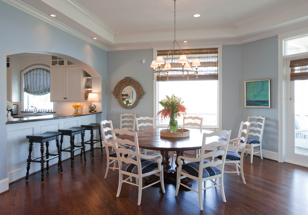 Large traditional kitchen/dining combo in Houston with blue walls and dark hardwood floors.