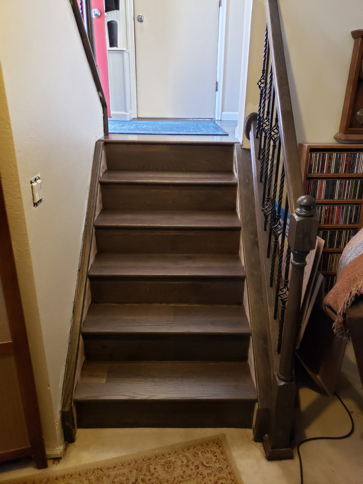 Classic Iron Balusters & Dark Wood Staircase Transformation