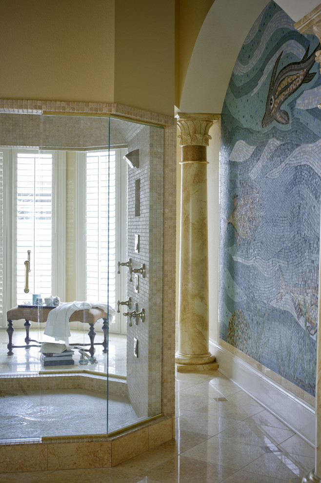 This is an example of a mediterranean bathroom in Little Rock with mosaic tile.