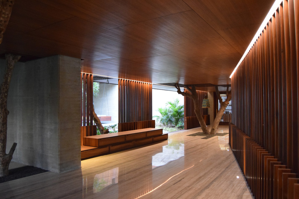 Hallway - large contemporary marble floor hallway idea in Ahmedabad