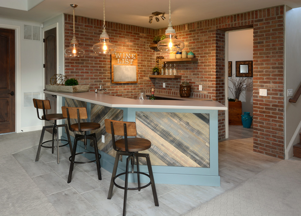 This is an example of a mid-sized transitional home bar in Denver.